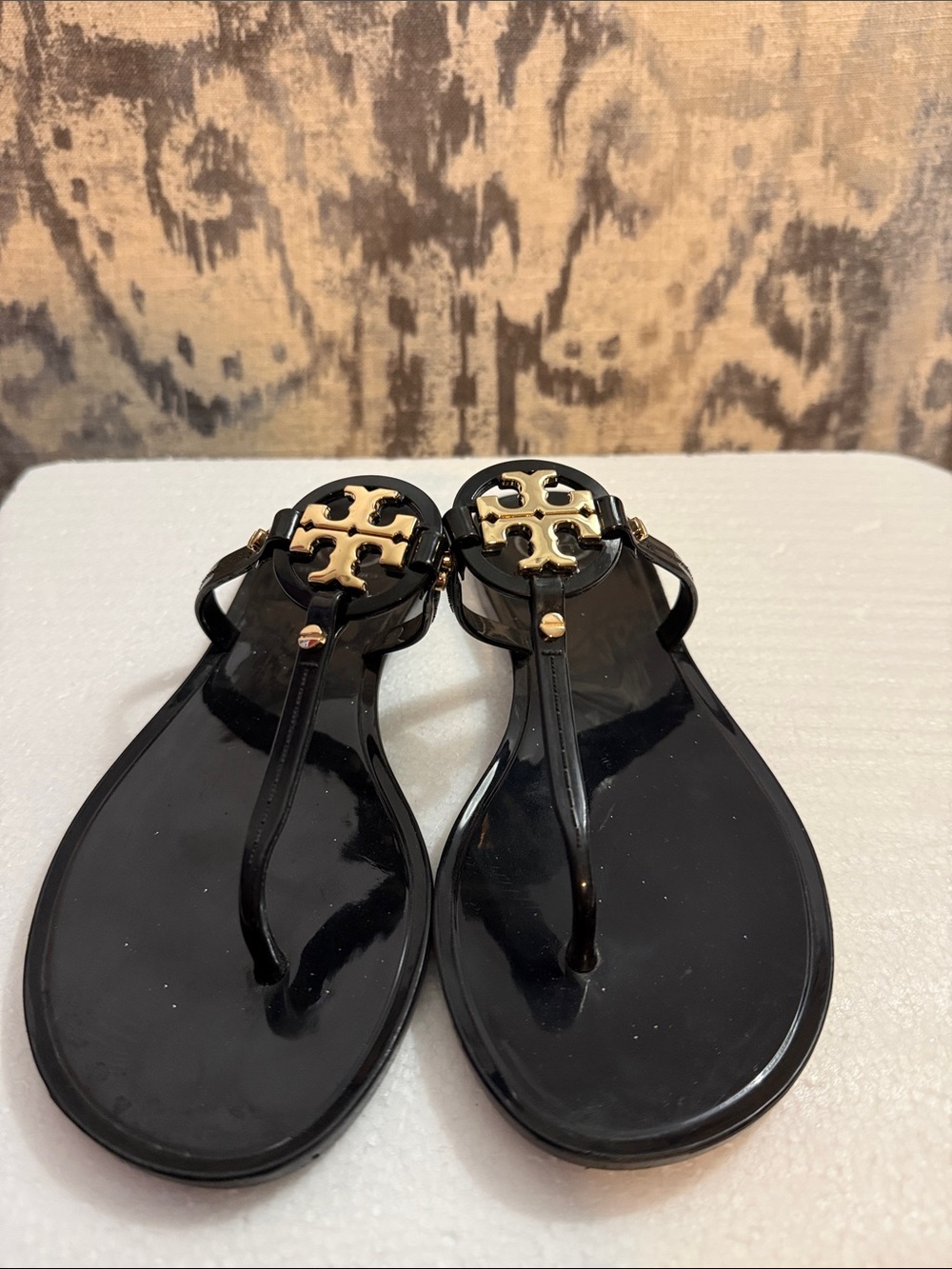 Tory Burch Black Jelly Thong Sandals with Gold Logo Medallions